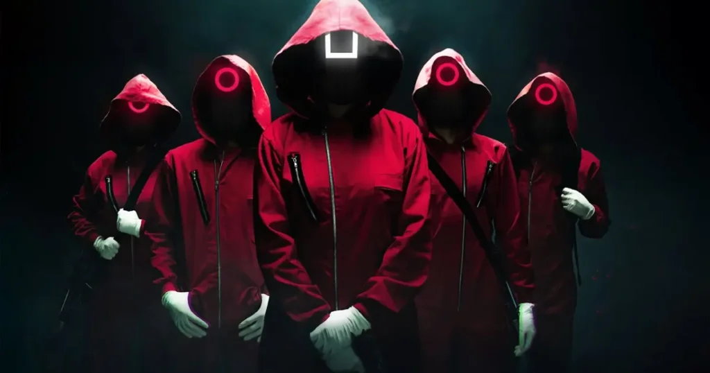 A group of five people in red hoodies stands in front of a black backdrop, showcasing their "Funny Clan Names.